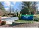 Davis Drive Park sign with manicured landscaping in a serene outdoor setting at 200 Gravel Brook Ct, Cary, NC 27519