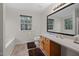 Bathroom with large vanity, sink, tile flooring, and decorative mirror at 2114 Frissell Ave, Apex, NC 27502