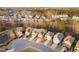An aerial shot showcases a well-planned neighborhood layout with sidewalks and manicured lawns at 2117 Mckenzie Ridge Lane Ln, Apex, NC 27502