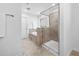 Clean and modern bathroom with glass shower and separate tub at 2117 Mckenzie Ridge Lane Ln, Apex, NC 27502