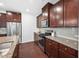 Modern kitchen with granite countertops and stainless steel appliances at 2117 Mckenzie Ridge Lane Ln, Apex, NC 27502