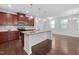Spacious kitchen island, granite countertops, stainless steel appliances and hardwood floors at 2117 Mckenzie Ridge Lane Ln, Apex, NC 27502