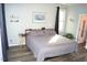 Serene bedroom with modern flooring and plenty of natural light at 2213 Oakhurst Trl, Hillsborough, NC 27278