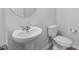 Bathroom featuring a pedestal sink and toilet at 236 Shingle Oak Rd, Wake Forest, NC 27587