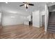 Open floor plan showcases the kitchen island, stainless steel appliances, and staircase at 236 Shingle Oak Rd, Wake Forest, NC 27587
