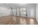 Bright living room with hardwood floors and large windows at 236 Shingle Oak Rd, Wake Forest, NC 27587