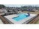 Community pool with a slide and covered seating area creates an appealing recreation space at 236 Shingle Oak Rd, Wake Forest, NC 27587