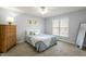 Serene bedroom with soft lighting, comfortable bed, and dresser at 2820 Bedfordshire Ct, Raleigh, NC 27604