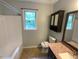 Bathroom with a shower-tub, toilet, vanity, and modern fixtures at 308 Trimble Ave, Cary, NC 27511