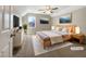 Bedroom with soft carpet, light colored walls, ceiling fan, and natural light at 308 Trimble Ave, Cary, NC 27511