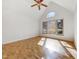 Bright bedroom with a large window, hardwood floors and natural light at 308 Trimble Ave, Cary, NC 27511