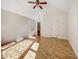 Bright bedroom with a ceiling fan, light walls, a window and hardwood floors at 308 Trimble Ave, Cary, NC 27511