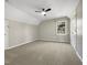 Neutral bedroom with carpet, a ceiling fan, and a window overlooking the yard at 308 Trimble Ave, Cary, NC 27511