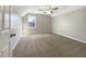 Cozy bedroom with neutral carpeting, light walls and a window with natural light at 308 Trimble Ave, Cary, NC 27511