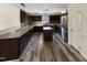 Kitchen with wooden cabinets, stainless steel appliances, an island and wood floors at 308 Trimble Ave, Cary, NC 27511