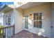 Back deck area with wood floors and neutral colored siding, perfect for relaxation at 4120 Standing Rock Way, Raleigh, NC 27604