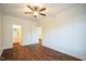 Spacious bedroom with wood floors and an adjoining bathroom at 4120 Standing Rock Way, Raleigh, NC 27604