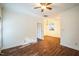 Open-concept living space showcasing hardwood floors, neutral walls, and seamless flow into the kitchen at 4120 Standing Rock Way, Raleigh, NC 27604