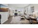 Inviting living room with modern decor, updated flooring, and plenty of natural light at 4918 Neuse Commons Ln, Raleigh, NC 27616