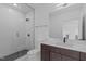 Modern bathroom with glass-enclosed shower, stylish vanity, and updated fixtures at 615 W Peace St # 406, Raleigh, NC 27605