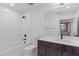 Bathroom featuring combination tub and shower with a white sink vanity at 615 W Peace St # 406, Raleigh, NC 27605