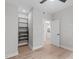 Bedroom with light wood floors, ceiling fan, and walk-in closet at 615 W Peace St # 406, Raleigh, NC 27605