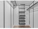 Walk-in closet with wire shelving and storage baskets at 615 W Peace St # 406, Raleigh, NC 27605