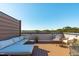 Outdoor rooftop deck area with comfortable lounge seating and tables for an inviting entertainment space at 615 W Peace St # 406, Raleigh, NC 27605