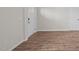 Entryway showing wood-look flooring and door at 6453 Alfalfa Ln, Wake Forest, NC 27587