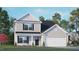 Charming two-story home featuring a black roof, white garage door, and well-manicured lawn at 6453 Alfalfa Ln, Wake Forest, NC 27587