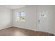 Cozy room with a large window and nearby front door at 6453 Alfalfa Ln, Wake Forest, NC 27587