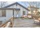 Backyard deck with outdoor seating on a sunny day at 723 Holloway St, Durham, NC 27701