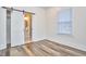 Bedroom with an ensuite bathroom featuring an updated vanity and glass shower at 723 Holloway St, Durham, NC 27701