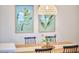 Dining room decor featuring modern tropical artwork and wood table at 723 Holloway St, Durham, NC 27701