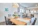 Dining room with modern decor connected to the kitchen at 723 Holloway St, Durham, NC 27701