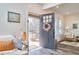 Welcoming entryway featuring an open door, hardwood floors, and a cozy interior view at 723 Holloway St, Durham, NC 27701