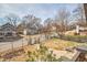 Front yard view features a fence and stone steps leading to the front door at 723 Holloway St, Durham, NC 27701