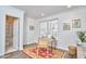 Bright office with connecting bathroom, hardwood floors, and modern desk at 723 Holloway St, Durham, NC 27701