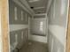 Unfinished bathroom with a shower and tub combination at 73 Grace Pond Ave, Benson, NC 27504
