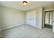 Bedroom with closet and plush carpet at 73 Grace Pond Ave, Benson, NC 27504