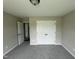 Bedroom with large double closet doors and neutral walls, featuring soft carpeting at 73 Grace Pond Ave, Benson, NC 27504
