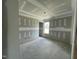 Unfinished bedroom featuring a window and doorway at 73 Grace Pond Ave, Benson, NC 27504