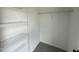 Spacious closet with wire shelving on the walls providing storage solutions at 73 Grace Pond Ave, Benson, NC 27504