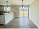 Dining room with an open layout, pendant lighting, and sliding glass doors to the outside at 73 Grace Pond Ave, Benson, NC 27504
