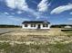 Newly constructed single-Gathering home with black shutters at 73 Grace Pond Ave, Benson, NC 27504