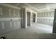 Unfinished living room featuring an open floor plan and abundant natural light at 73 Grace Pond Ave, Benson, NC 27504