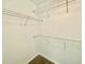 Walk-in closet with white wire shelving at 73 Grace Pond Ave, Benson, NC 27504