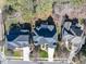 Aerial view of beautiful homes with mature landscaping and manicured lawns at 803 Landuff Ct, Cary, NC 27519