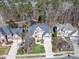 Aerial view showcases the property's layout, surrounding trees, and proximity to neighboring homes in a desirable location at 803 Landuff Ct, Cary, NC 27519