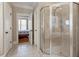Shower in luxurious bathroom with tiled floor at 803 Landuff Ct, Cary, NC 27519